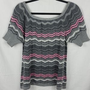 A wet paint short sleeve knit top. Size S to M.